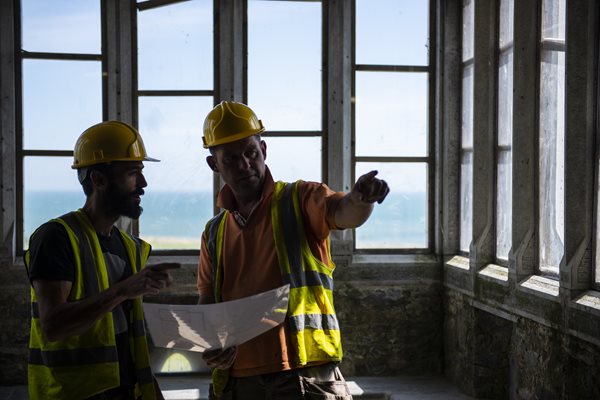 Construction workers in heritage building